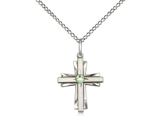 Sterling Silver Cross Pendant with a 3mm Peridot Swarovski stone on a 18 inch Sterling Silver Light Curb Chain.