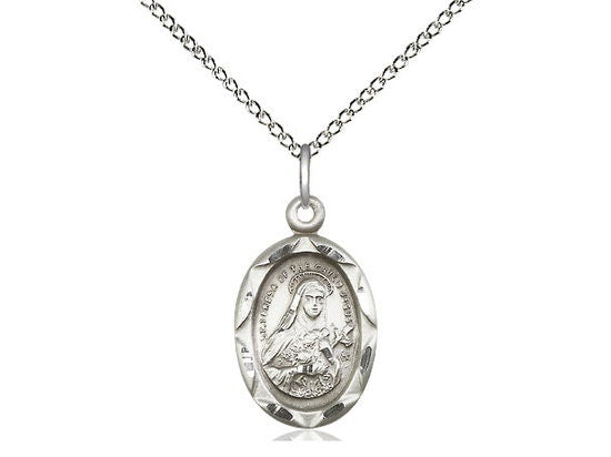 St Theresa Sterling Silver Pendant on a 18 inch Sterling Silver Light Curb Chain.