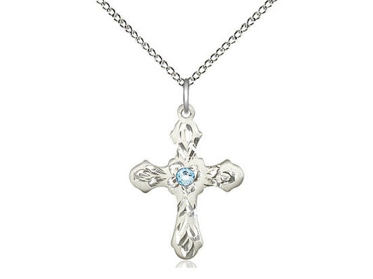 Sterling Silver Cross Pendant with a 3mm Aqua Swarovski stone on a 18 inch Sterling Silver Light Curb Chain.