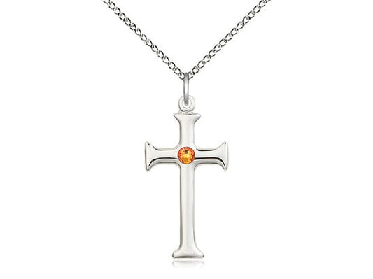 Sterling Silver Cross Pendant with a 3mm Topaz Swarovski stone on a 18 inch Sterling Silver Light Curb Chain.