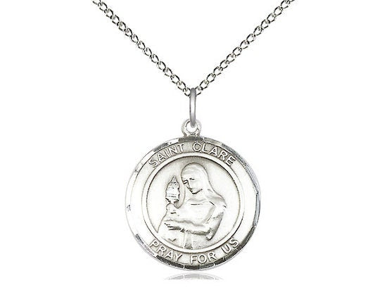 St Clare of Assisi Sterling Silver Pendant on a 18 inch Sterling Silver Light Curb Chain.